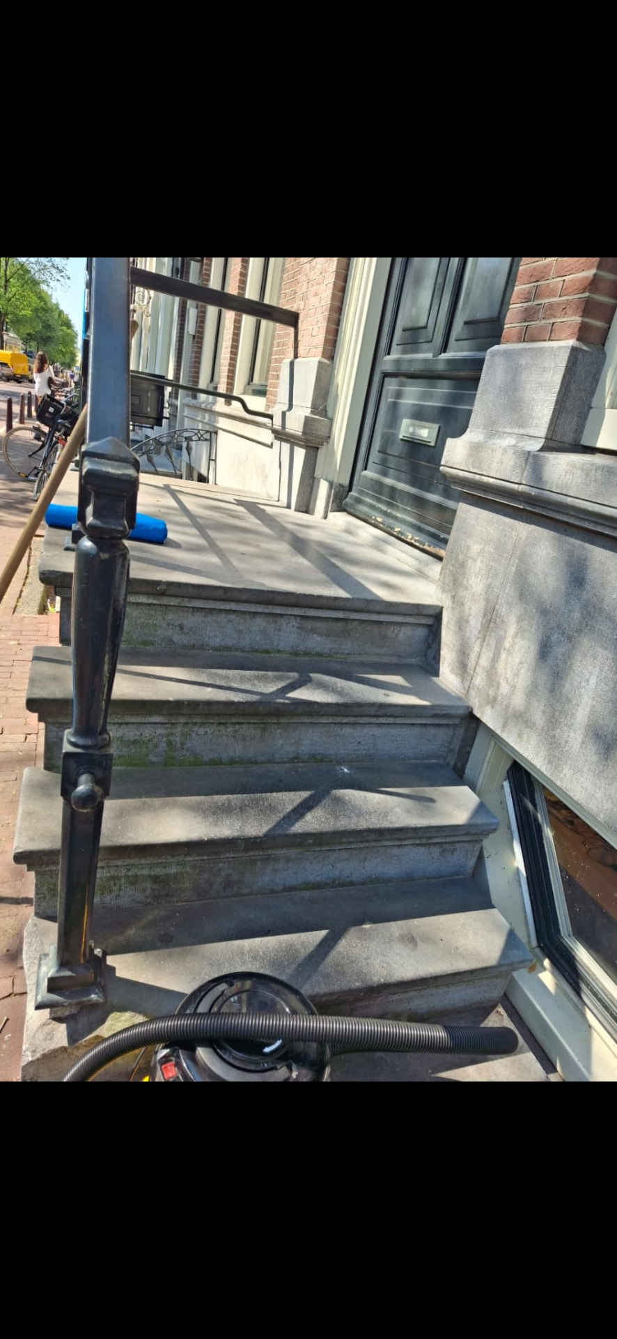 Bluestone porch and steps cleaned at a historic building